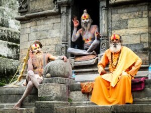 Naga sadhu sitting on a temple 