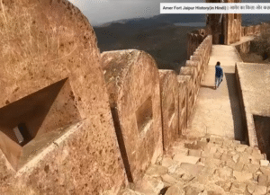 walls - Jaigarh Fort – majestic Jaipur’s Iron Shield of the Rajputs Massive red sandstone walls and watchtowers of Jaigarh Fort overlooking the Aravalli Hills