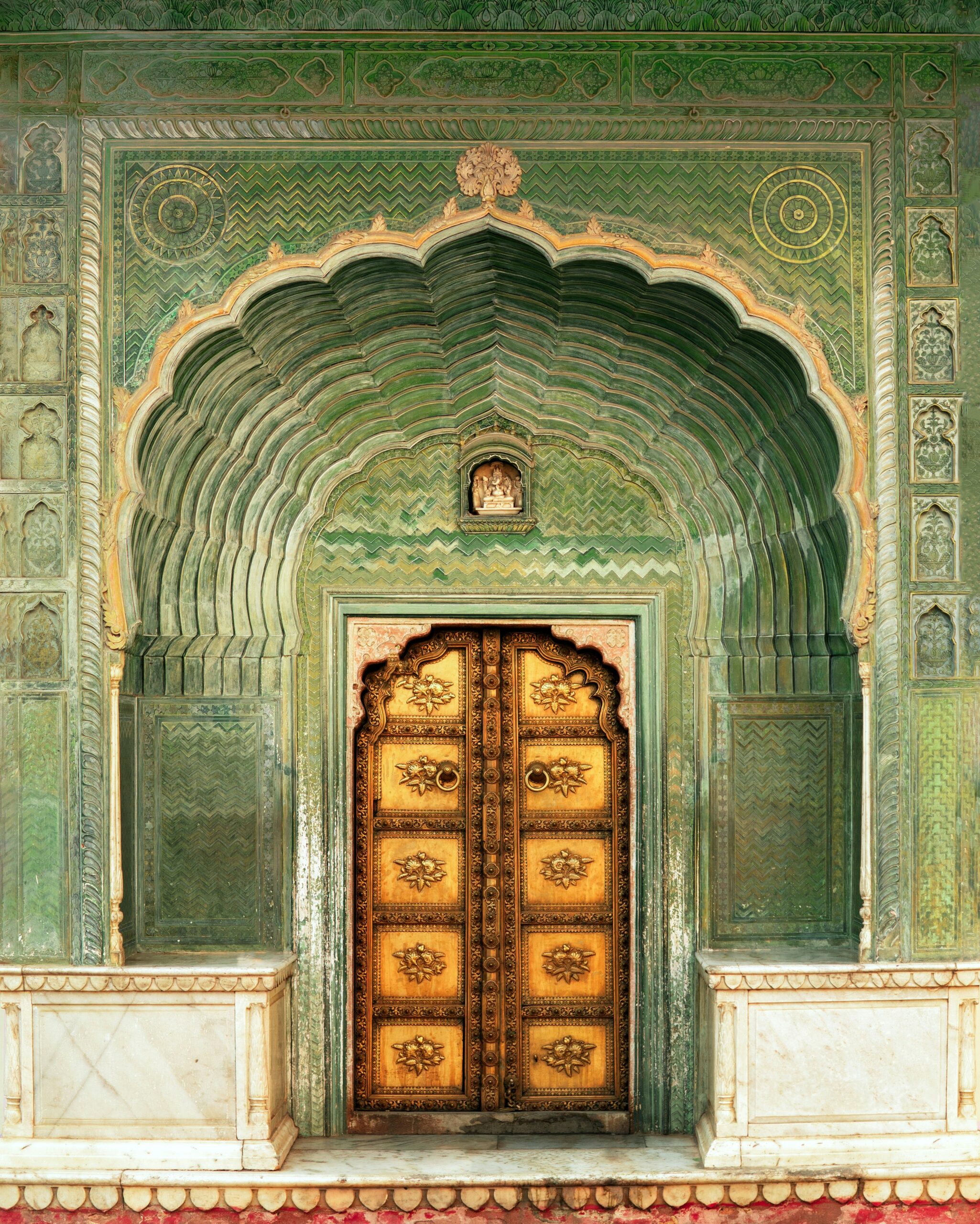 rahul chakraborty NKSnOmFOKLw unsplash scaled - City Palace Jaipur : Where Royalty Still Whispers Through Walls Peacock Gate at City Palace Jaipur, decorative mosaic arch with peacock motifs